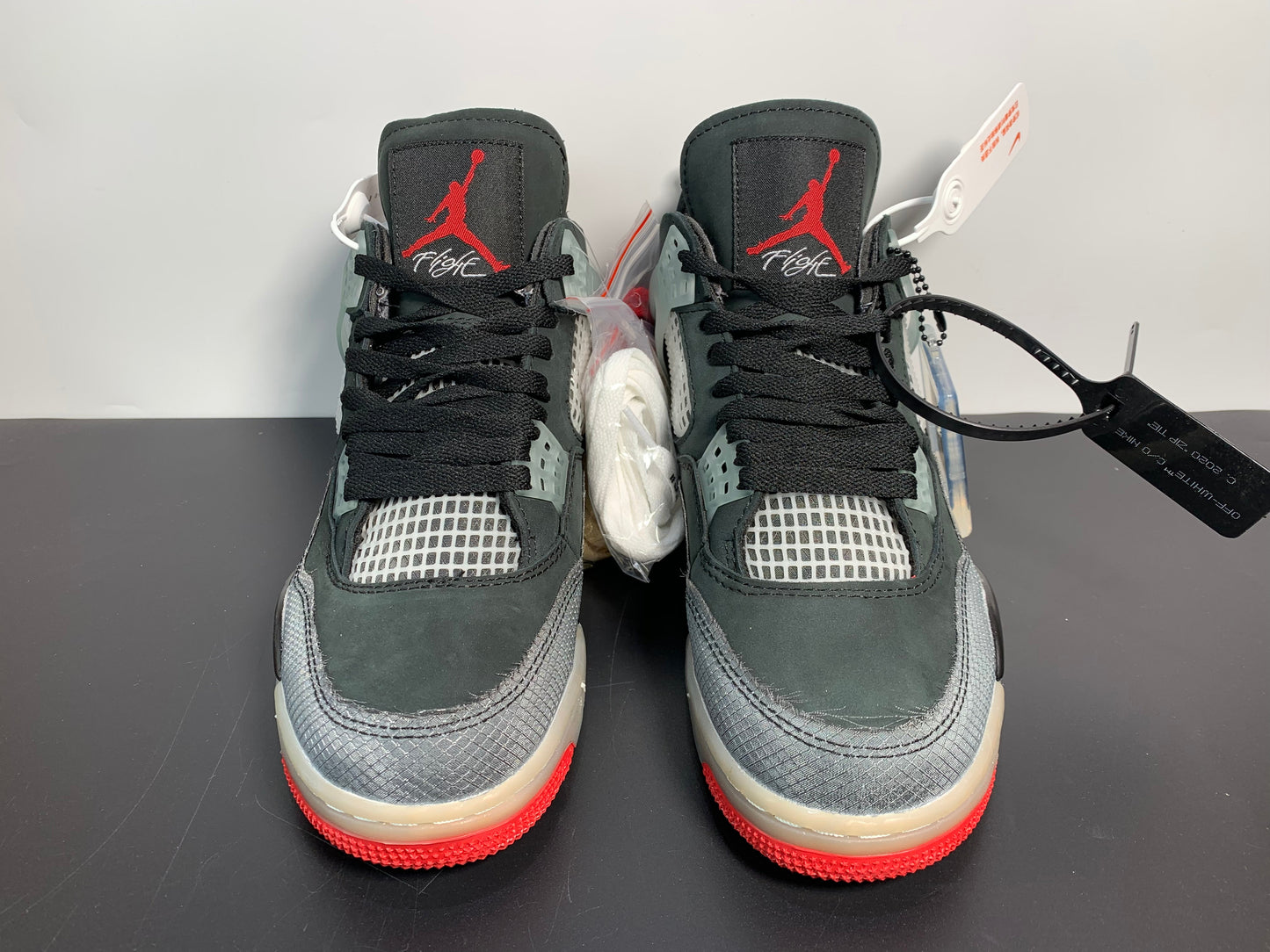 OFF-WHITE x Air Jordan 4 “Bred” CV9388-001